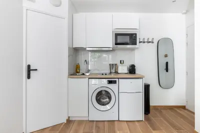 Cuisine ou kitchenette dans l'établissement Nouvel Appartement Cosy Montparnasse