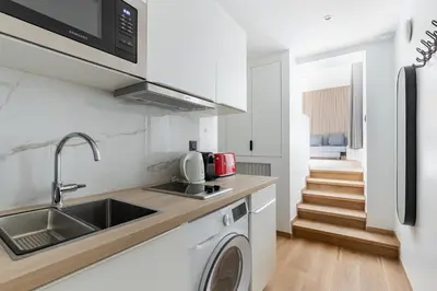 Cuisine ou kitchenette dans l'établissement Nouvel Appartement Cosy Montparnasse