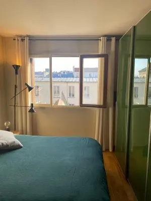 Un ou plusieurs lits dans un hébergement de l'établissement Apartment in Montmartre