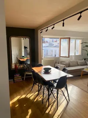 Coin salon dans l'établissement Apartment in Montmartre