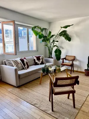Coin salon dans l'établissement Apartment in Montmartre
