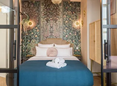 Un ou plusieurs lits dans un hébergement de l'établissement Sophie Stay - Le Mucha - King size bed - AC