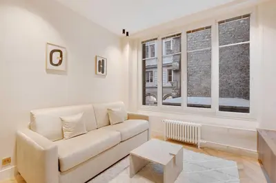 Coin salon dans l'établissement New Home - 1BR-4P - Saint Germain