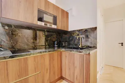Cuisine ou kitchenette dans l'établissement New Home - 1BR-4P - Saint Germain