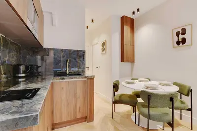 Cuisine ou kitchenette dans l'établissement New Home - 1BR-4P - Saint Germain