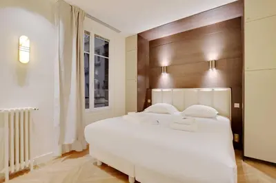 Un ou plusieurs lits dans un hébergement de l'établissement New Home - 1BR-4P - Saint Germain