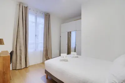 Un ou plusieurs lits dans un hébergement de l'établissement Pick A Flat's Apartment in Reuilly-Diderot - Rue de Reuilly