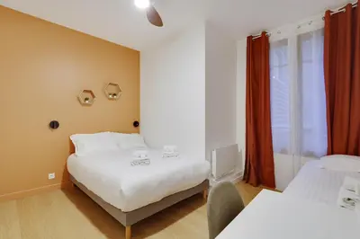 Un ou plusieurs lits dans un hébergement de l'établissement Pick A Flat's Apartment in Reuilly-Diderot - Rue de Reuilly