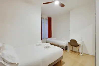 Un ou plusieurs lits dans un hébergement de l'établissement Pick A Flat's Apartment in Reuilly-Diderot - Rue de Reuilly
