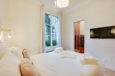 Un ou plusieurs lits dans un hébergement de l'établissement Comfy Suite