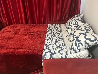 Un ou plusieurs lits dans un hébergement de l'établissement Appart Paris 10 eme