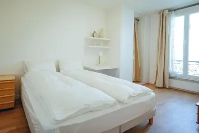 Un ou plusieurs lits dans un hébergement de l'établissement Paris15em Charles Michels Appartement