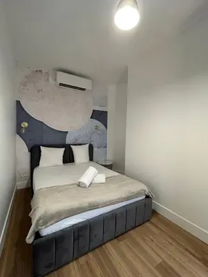 Un ou plusieurs lits dans un hébergement de l'établissement Appartement cosy - Quartier Saint-Georges - 4P