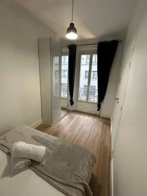 Un ou plusieurs lits dans un hébergement de l'établissement Appartement cosy - Quartier Saint-Georges - 4P
