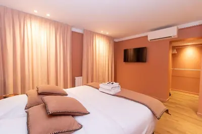 Un ou plusieurs lits dans un hébergement de l'établissement Apartment Center of Paris Bastille by Studio prestige