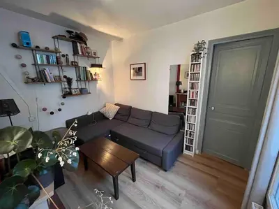 Coin salon dans l'établissement Appartement/Gobelins