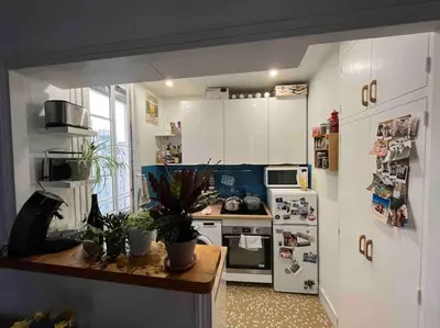 Cuisine ou kitchenette dans l'établissement Appartement/Gobelins