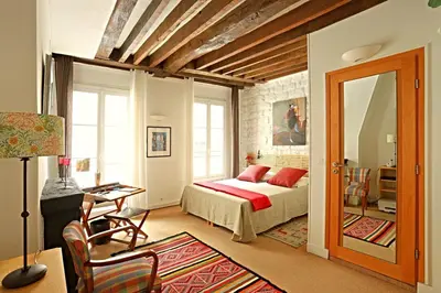 Un ou plusieurs lits dans un hébergement de l'établissement Chic Flat Paris VI