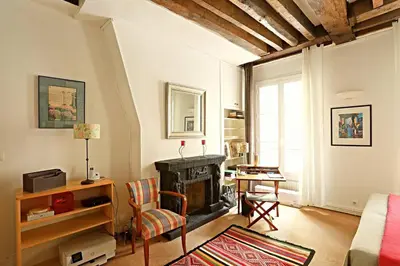 Coin salon dans l'établissement Chic Flat Paris VI