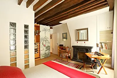 Un ou plusieurs lits dans un hébergement de l'établissement Chic Flat Paris VI