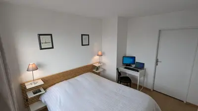 Un ou plusieurs lits dans un hébergement de l'établissement Paris'door Cozy 2P 50m² all equipped in a village