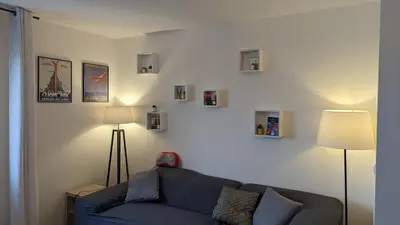Coin salon dans l'établissement Paris'door Cozy 2P 50m² all equipped in a village