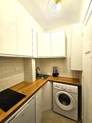 Cuisine ou kitchenette dans l'établissement Comme une suite près du métro