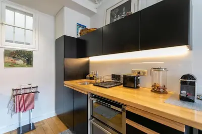 Cuisine ou kitchenette dans l'établissement Amazing flat Jardin du Luxembourg