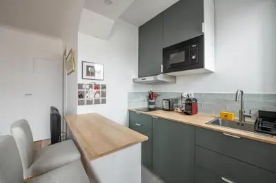 Cuisine ou kitchenette dans l'établissement PARIS 6EME - Studio
