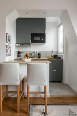 Cuisine ou kitchenette dans l'établissement PARIS 6EME - Studio