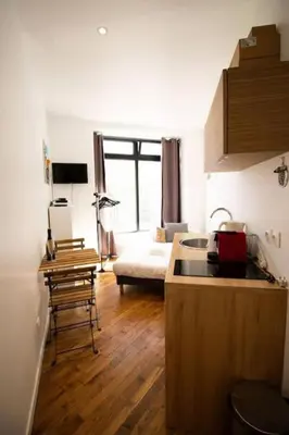 Cuisine ou kitchenette dans l'établissement Studio 2 personnes proche Gare du Nord