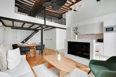 Coin salon dans l'établissement Charming Apartment - 1BR-5P - Sentier