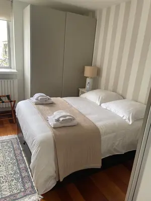 Un ou plusieurs lits dans un hébergement de l'établissement Chambre chez l'habitant avec Salle de bain à partager - homestay