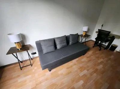 Coin salon dans l'établissement Très beau 2 pièces à 400m de Paris