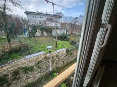 Jardin de l'établissement Très beau 2 pièces à 400m de Paris