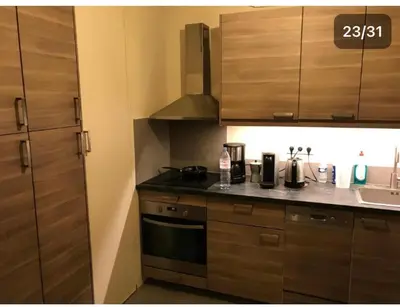Cuisine ou kitchenette dans l'établissement Pavillon 1 à 4 personnes chez l’habitant parfait pour une famille