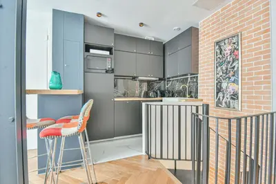 Cuisine ou kitchenette dans l'établissement Duplex à Paris Saint-Ambroise