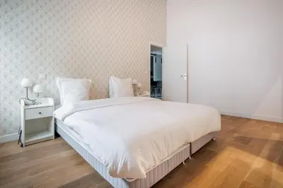 Un ou plusieurs lits dans un hébergement de l'établissement Chaleureux appartement pour 6pers #4