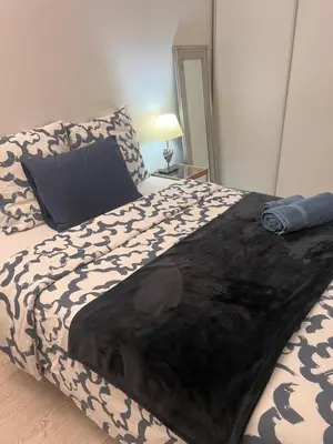 Un ou plusieurs lits dans un hébergement de l'établissement Double Room with Balcony
