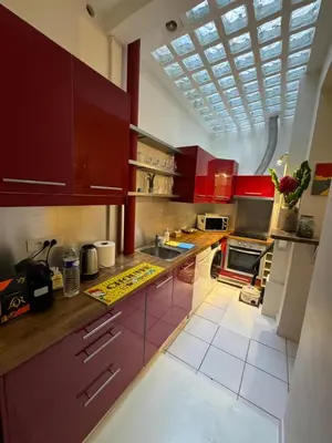 Cuisine ou kitchenette dans l'établissement Amy