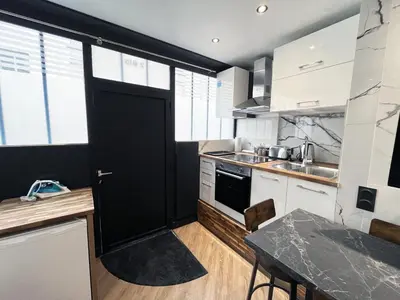 Cuisine ou kitchenette dans l'établissement Urban Flat 172 - Pretty Flat Gaite Montparnasse Cinema