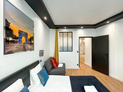 Un ou plusieurs lits dans un hébergement de l'établissement Urban Flat 173 - Charming Flat Atelier Gaite Montparnasse