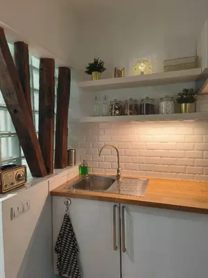 Cuisine ou kitchenette dans l'établissement 30m2 in the heart of Paris