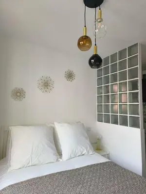 Un ou plusieurs lits dans un hébergement de l'établissement 30m2 in the heart of Paris