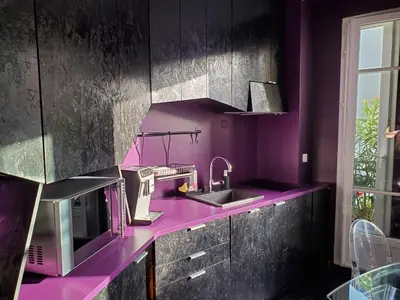 Cuisine ou kitchenette dans l'établissement Bel appartement à Clichy sur Seine