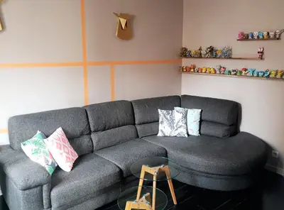 Coin salon dans l'établissement Bel appartement à Clichy sur Seine