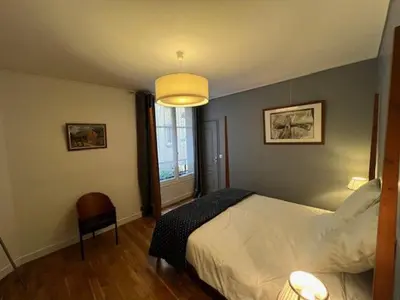 Un ou plusieurs lits dans un hébergement de l'établissement Appartement de grand standing en plein coeur de Paris à proximité du Trocadéro