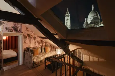 Un ou plusieurs lits dans un hébergement de l'établissement La Bohème Montmartre - Studios & Apartments de luxe au Sacré Coeur