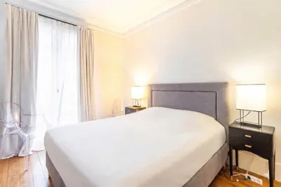 Un ou plusieurs lits dans un hébergement de l'établissement GuestReady - Séjour de charme dans le 6ème