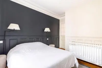 Un ou plusieurs lits dans un hébergement de l'établissement GuestReady - Séjour de charme dans le 6ème